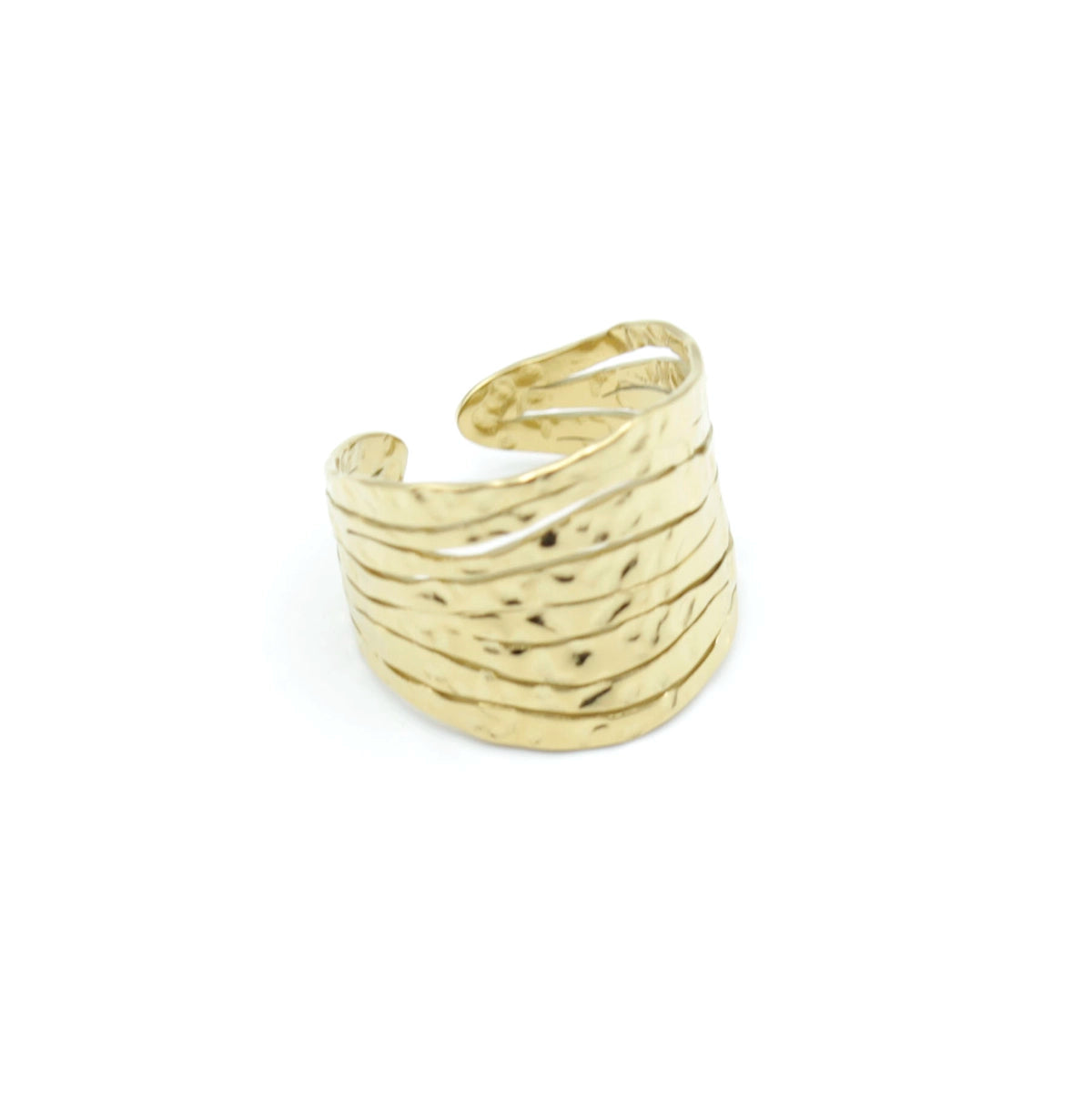 Anillo Marble acero inoxidable dorado, diseño de lineas juntas oscilando en conjunto. - delacabra