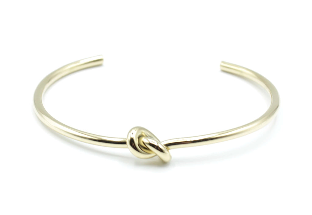 Brazalete Knot acero inoxidable dorado estructura abierta - delacabra