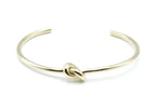 Brazalete Knot acero inoxidable dorado estructura abierta - delacabra