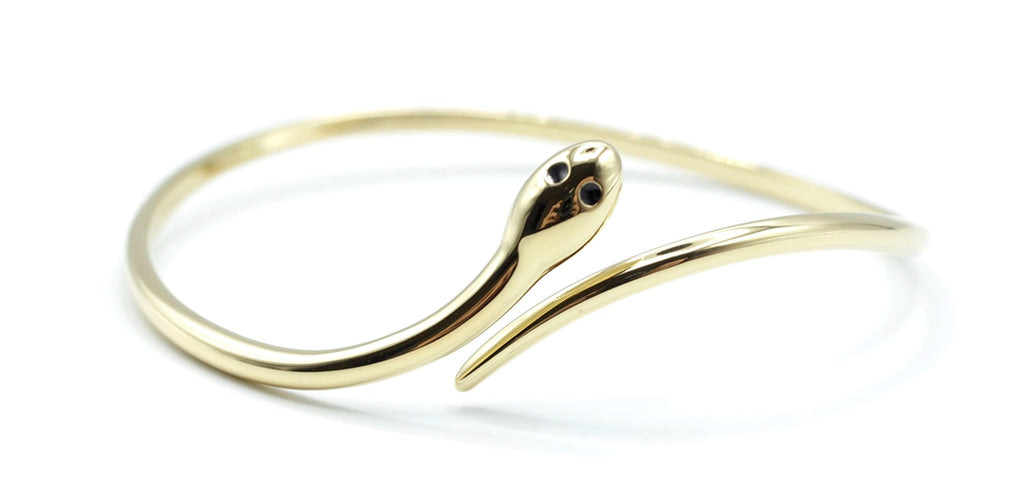 Brazalete Snake acero inoxidable dorado austable curvas sutiles y elegantes - delacabra