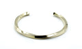 Brazalete Sweet Twist acero inoxidable dorado estructura abierta diseño en torsión muy vistosa - delacabra