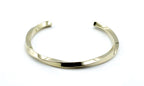 Brazalete Sweet Twist acero inoxidable dorado estructura abierta diseño en torsión muy vistosa - delacabra