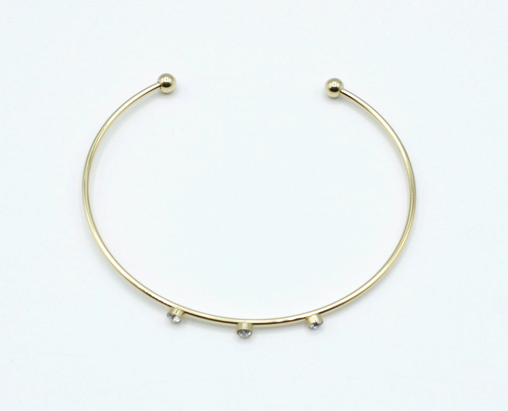 Brazalete Three Diamonds acero inoxidable dorado vista superior, extremos cuidadosamente acabados en dos bolas redondas perfectas - delacabra