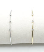 Brazaletes Three Diamonds acero inoxidable plateado y dorado ajustable en expositor  - delacabrae tela. diseño deslumbrante y atemporal - DELACABRA