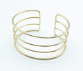 Brazalete Velvet acero inoxidable dorado ajustable cuatro lineas paralelas brillantes - delacabra