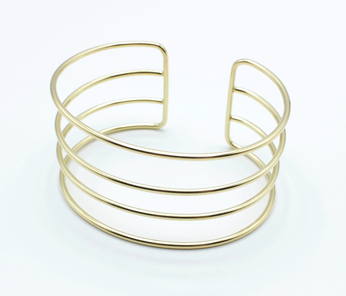 Brazalete Velvet acero inoxidable dorado ajustable cuatro lineas paralelas brillantes - delacabra