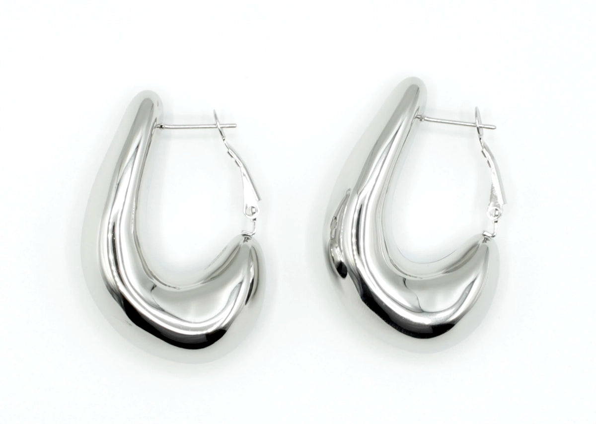 Pendientes Aro Jazz acero inoxidable plateado, dale un giro original a tu estilo con estos pendientes de diseño inspirados en el jazz, carácter y fluidez. - DELACABRA