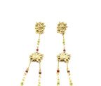 Pendientes jara acero inoxidable dorado acabado brillante, largos con caracter y diseño moderno. Delacabra