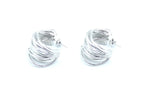 Pendientes de aro Anémona en acero inoxidable plateado de DELACABRA, no destiñen, ajustables y con diseño entrelazado, vista lateral