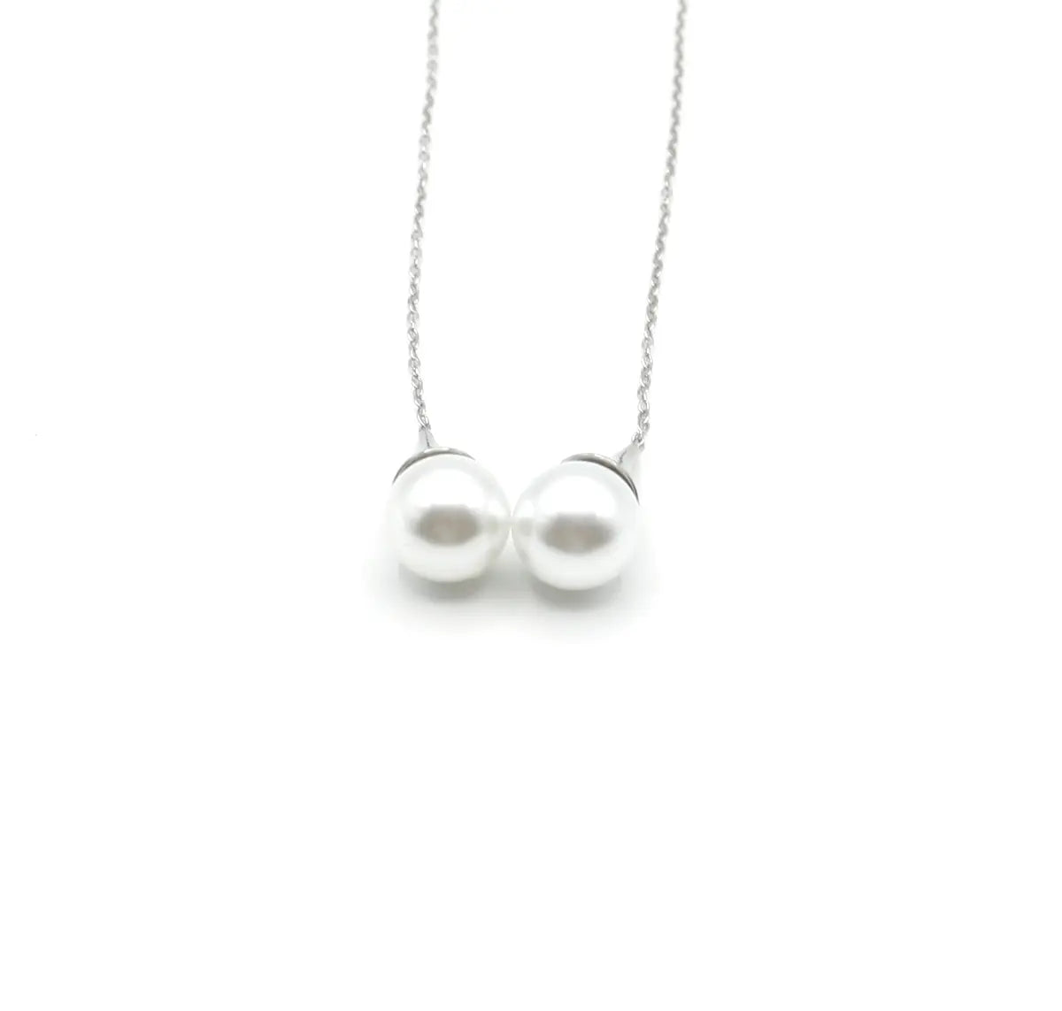 Pendientes largos Ivory diseño elegante moderno que pasa a través de muchas épocas, desde conservador hasta moderno y vanguardia. Delacabra