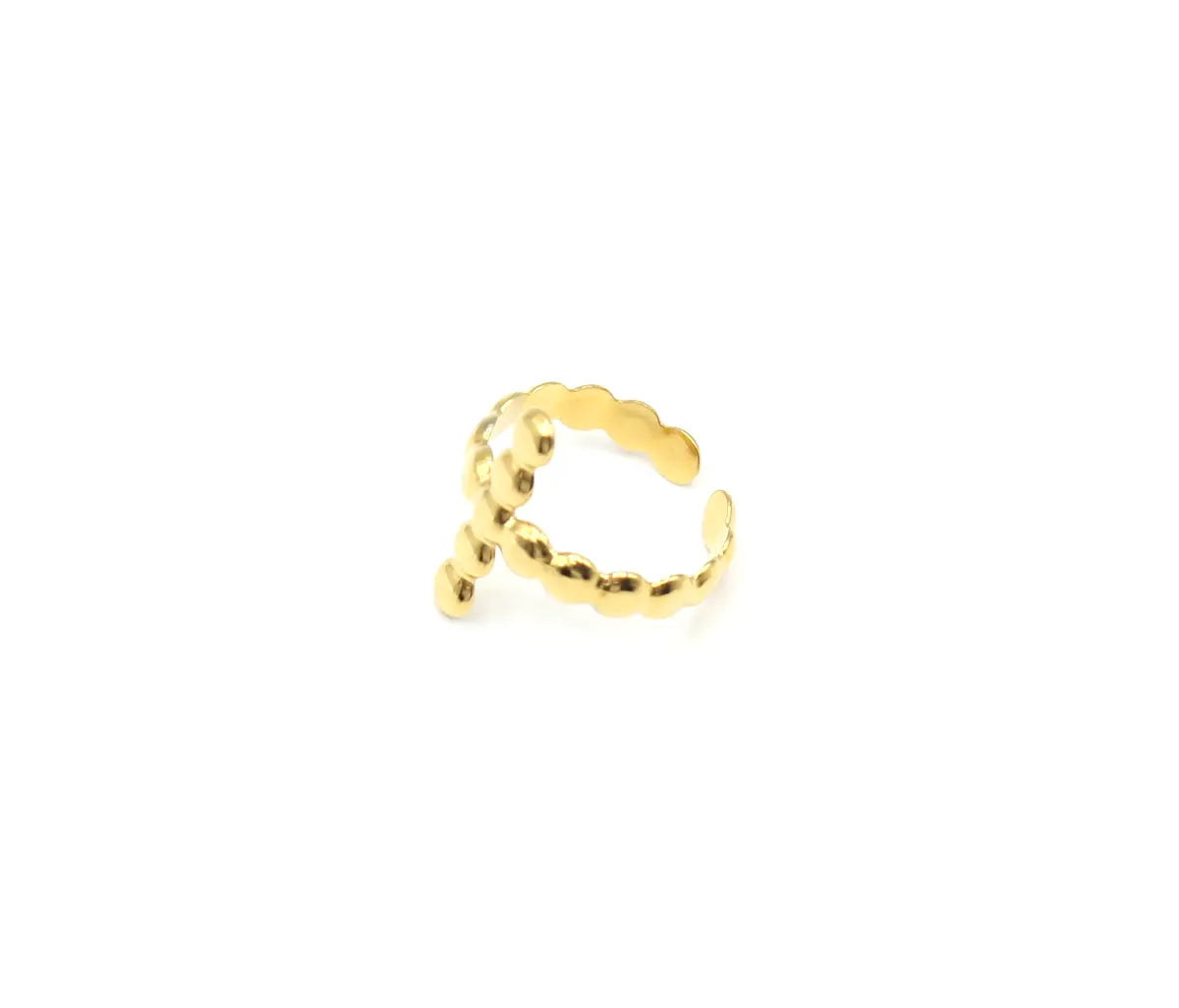 Vista lateral del anillo Chiara dorado, fabricado en acero inoxidable hipoalergénico y resistente - DELACABRA