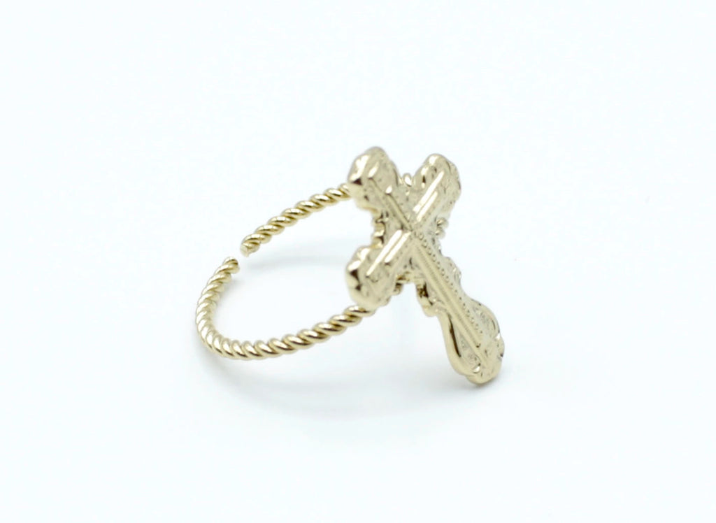 Anillo Paz acero inoxidable dorado diseño místico y espiritual en forma de cruz con detalles en relieve. - delacabra