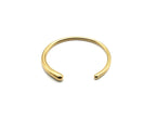 Brazalete Boreal de acero inoxidable dorado ajustable, estructura abierta con acabado brillante - DELACABRA