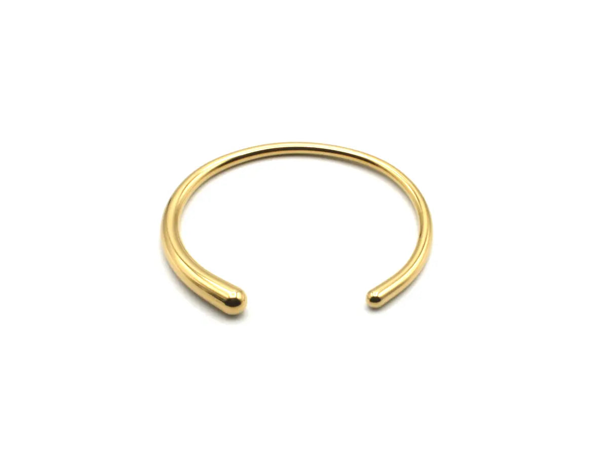 Brazalete Boreal de acero inoxidable dorado ajustable, estructura abierta con acabado brillante - DELACABRA
