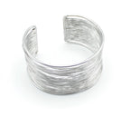 Brazalete Halo acero inoxidable plateado hilos entrelazados moderno y deslumbrante - delacabra