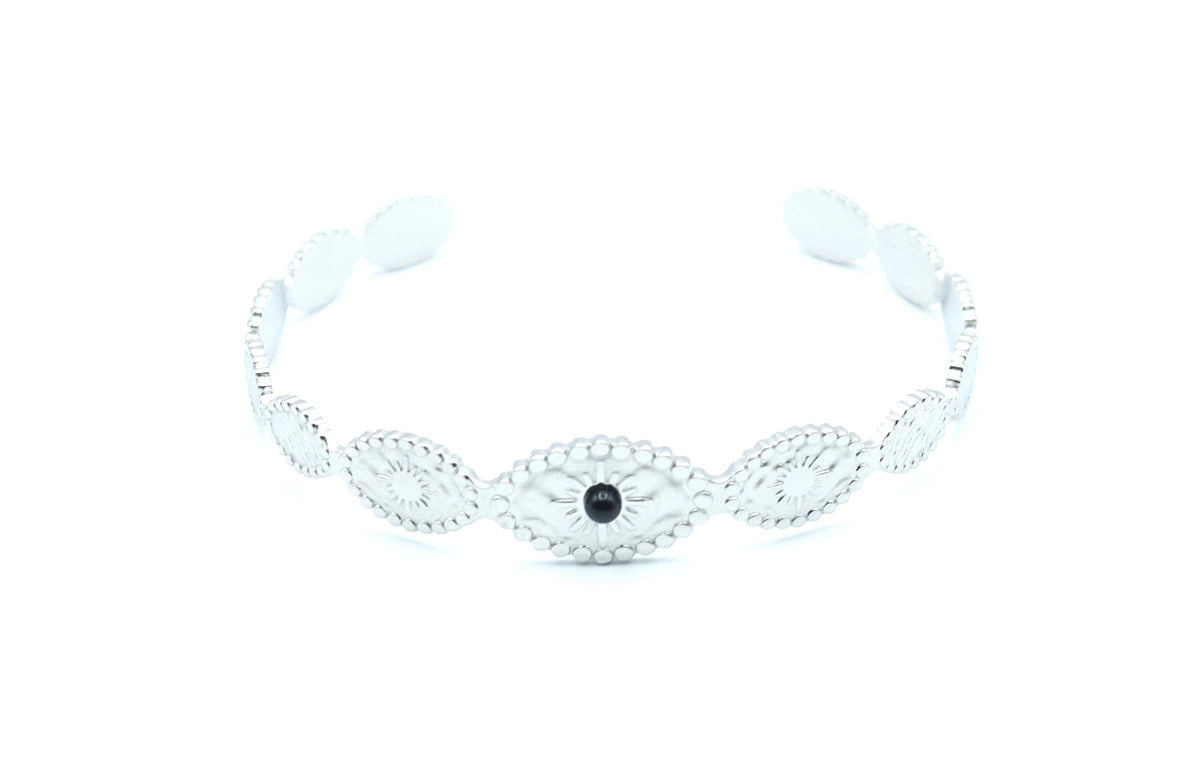 Brazalete Onde de acero inoxidable plateado ajustable vista del labrado y soles en su extensión -DELACABRA