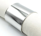 Brazalete Roma acero inoxidable plateado ajustable en contraste con tela neutra - delacabra