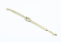 Brazalete Tangled acero inoxidable dorado entrelazado simulando un nudo llano, acabado suave y brillante - DELACABRA