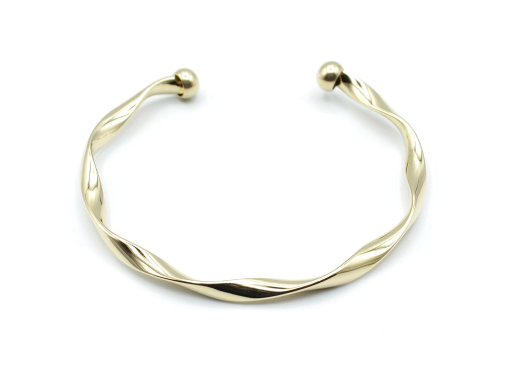 Brazalete Acqua dorado con extremos en forma de bola, acabado brillante y diseño helicoidal, acero inoxidable hipoalergénico, resistente al agua, ajustable y duradero -DELACABRA