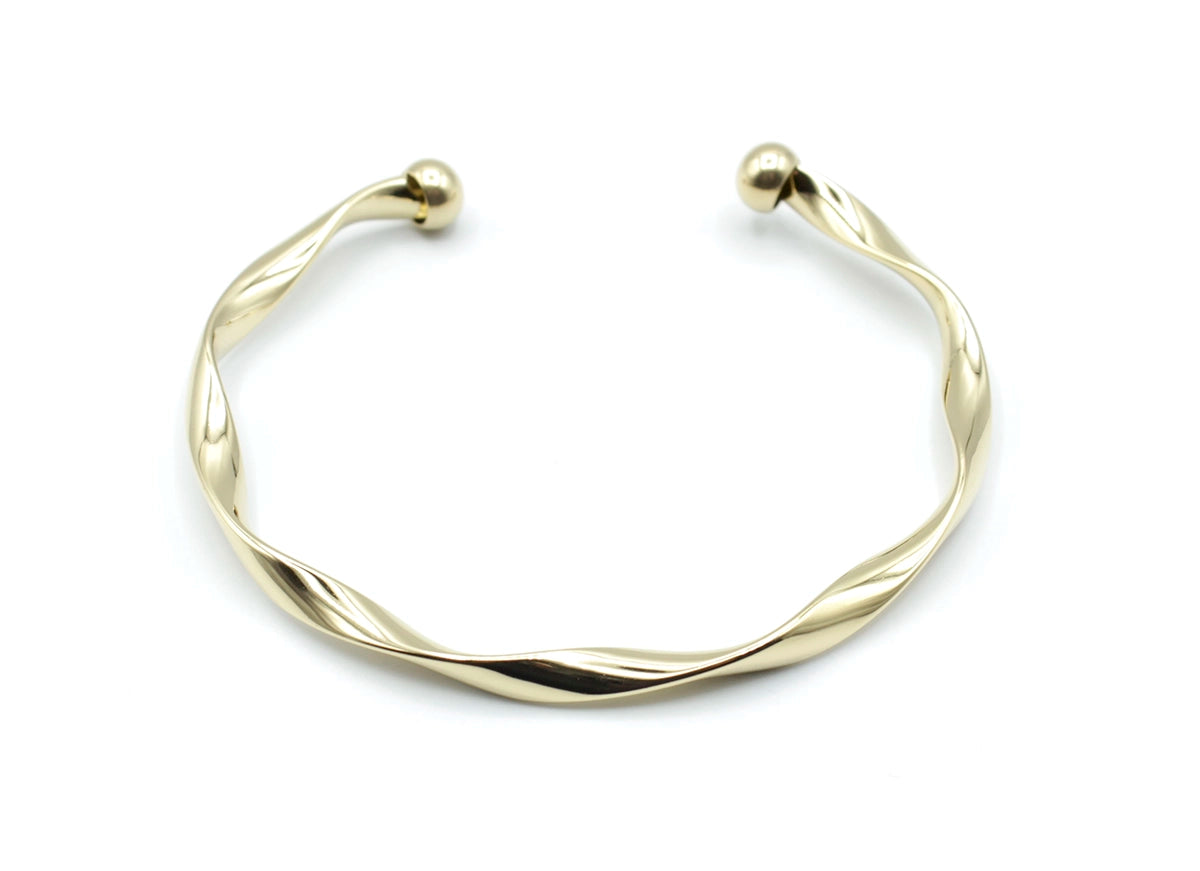 Brazalete Acqua dorado con extremos en forma de bola, acabado brillante y diseño helicoidal, acero inoxidable hipoalergénico, resistente al agua, ajustable y duradero -DELACABRA