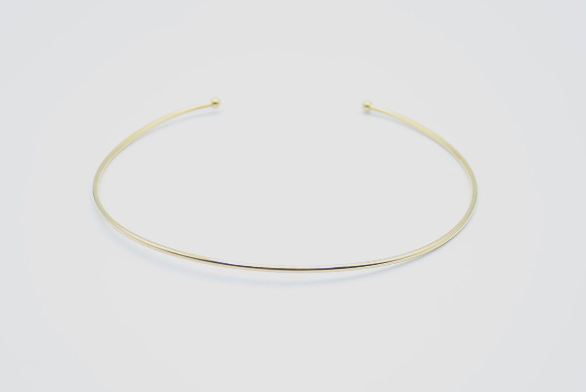 Choker Rosé acero inoxidable dorado ajustable, en fondo blanco con bordes redondeados, hiporalergénico, brillante y resistente. - delacabra