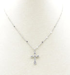 Collar Cross acero inoxidable plateado en busto de tela, cruz labrada y con cinco circonitas blancas que logran un destello y brillo especial en la joya. - DELACABRA