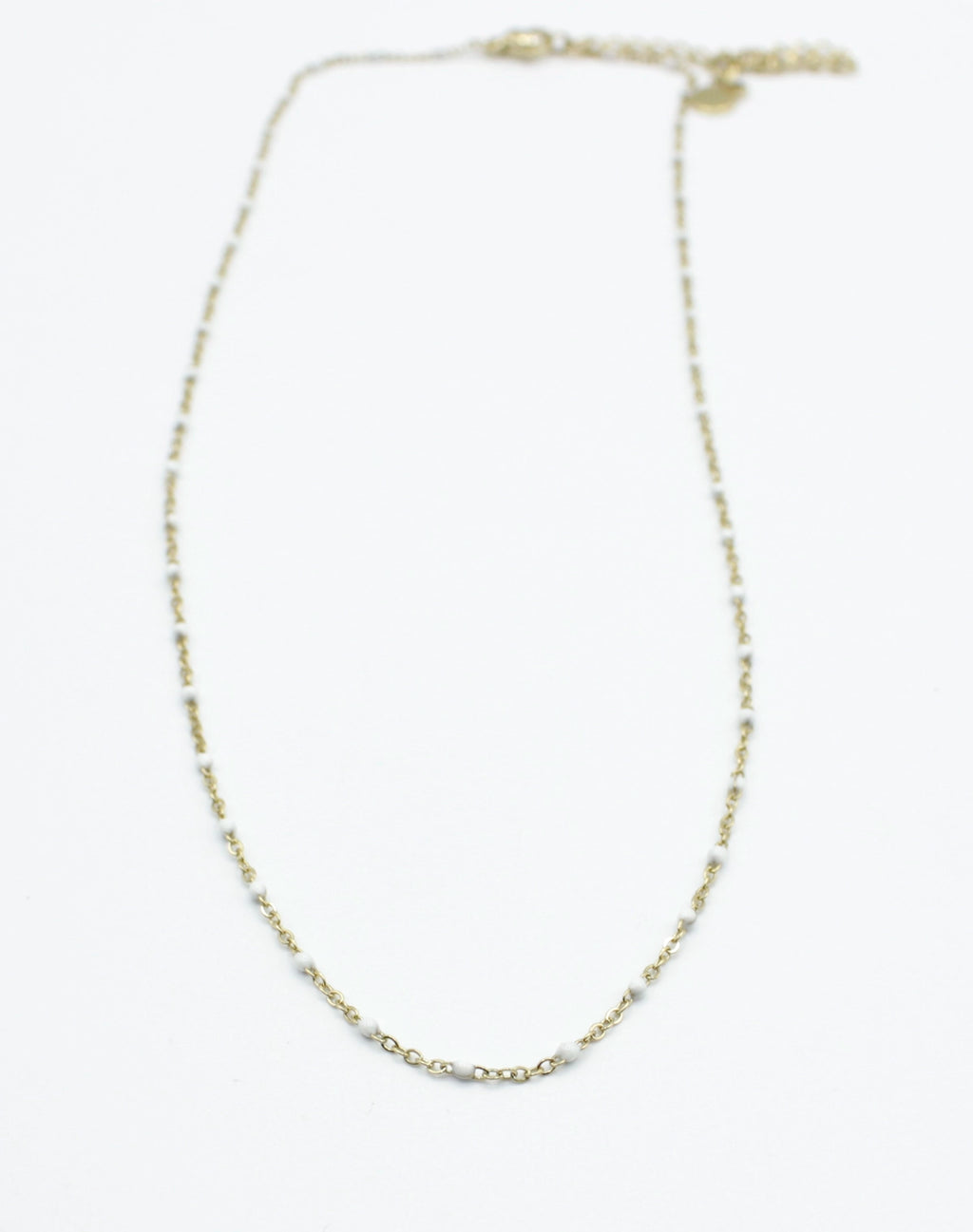 Collar Serena acero inoxidable dorado con puntos de resina blancos - delacabra