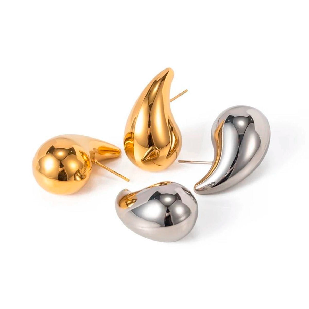Set de pendientes gota de acero inoxidable dorados y plateados, diseño moderno, fondo blanco
