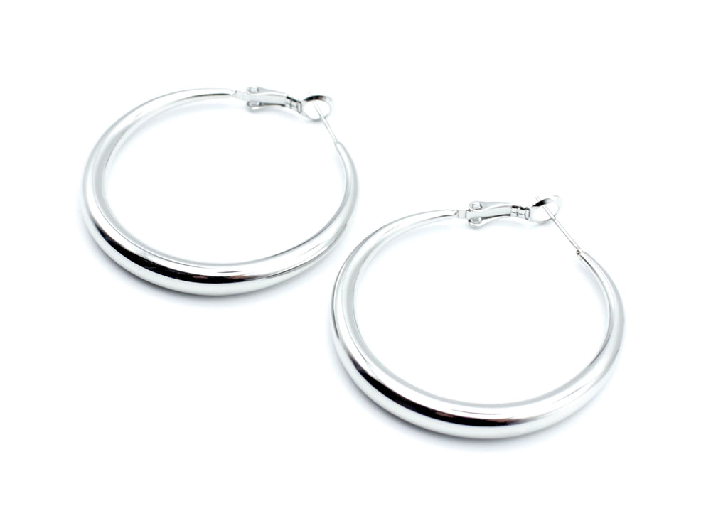 Pendientes Aro Basics acero inoxidable plateado, vista transversal. Pensada para ser clara, atractiva y con enfoque en conversión. - DELACABRA