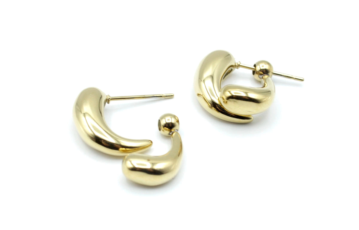 Pendientes Hugs acero inoxidable dorado diseño vanguardista, destacan por su originalidad y elegancia, acabado pulido brillante. - DELACABRA