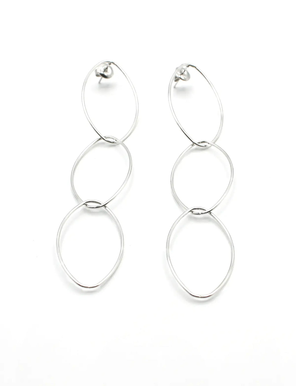 Pendientes Long dorados de acero inoxidable, tres aros en forma de elipse unidos, acabado brillante. DELACABRA 