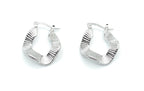 Pendientes Vera plateados con textura marcada, acero inoxidable hipoalergénico y elegante -DELACABRA